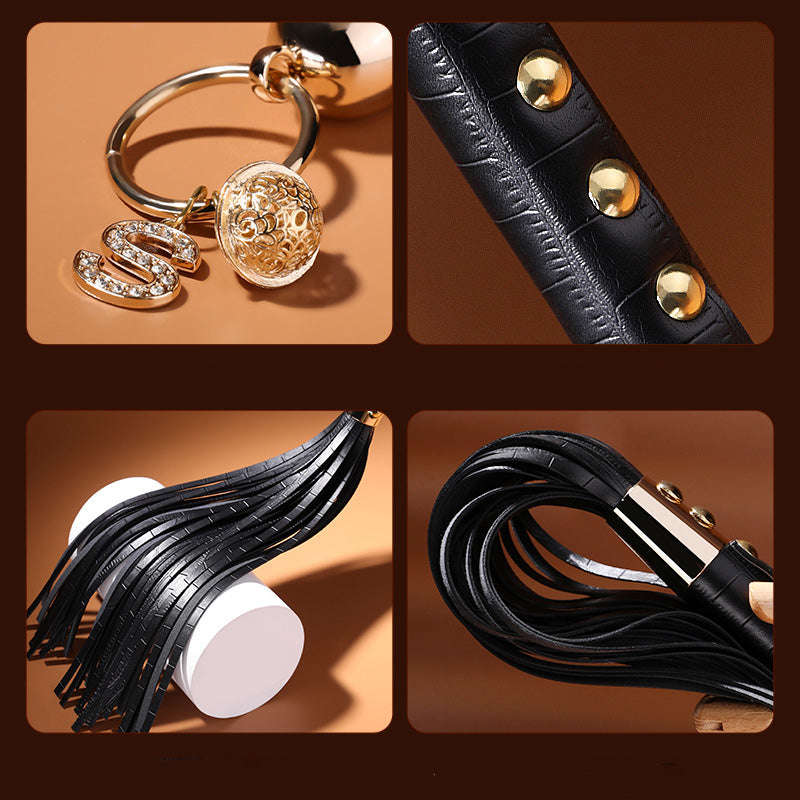 Enigma Gold Stud Handle Leather Flogger with Bell