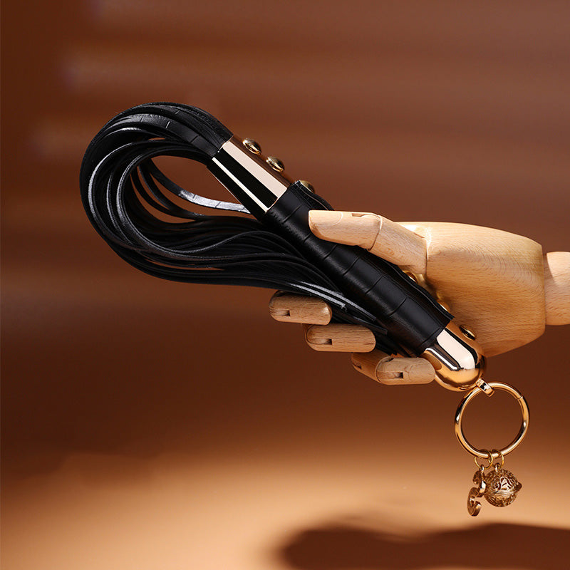 Enigma Gold Stud Handle Leather Flogger with Bell