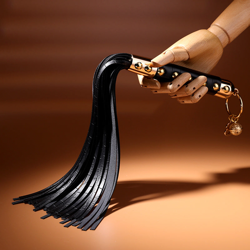 Enigma Gold Stud Handle Leather Flogger with Bell